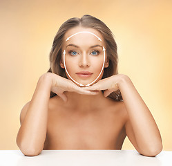 Image showing face and hands of beautiful woman