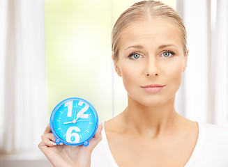 Image showing woman holding alarm clock