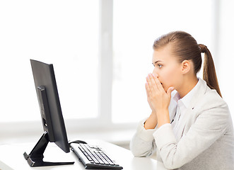 Image showing stressed student with computer in office