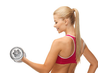 Image showing woman with heavy steel dumbbell