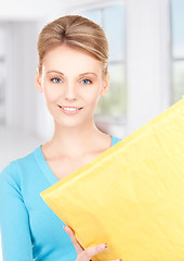 Image showing businesswoman with parcel