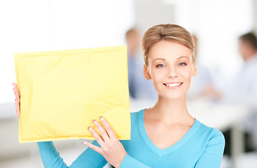 Image showing businesswoman with parcel