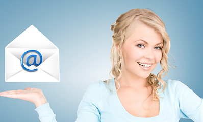 Image showing woman showing virtual envelope