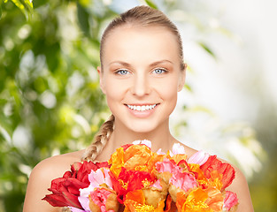 Image showing lovely woman with red flowers