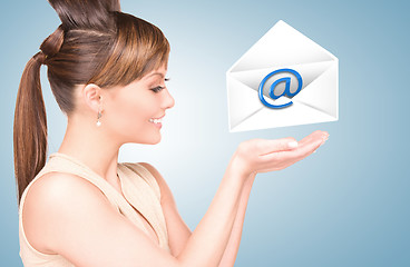 Image showing woman showing virtual envelope