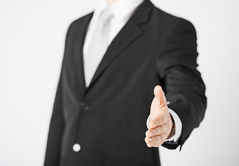 Image showing businessman with open hand