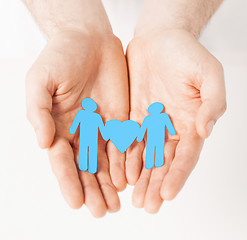 Image showing man hands with paper men