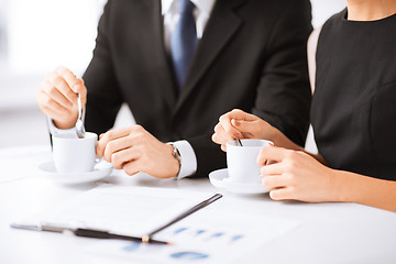 Image showing woman hand signing contract paper