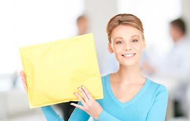 Image showing businesswoman with parcel