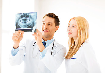 Image showing two doctors looking at x-ray