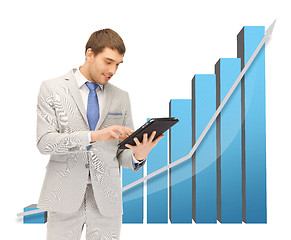 Image showing businessman with big 3d chart