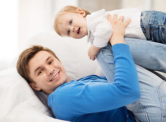 Image showing happy father with adorable baby