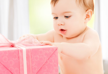 Image showing happy child with gift box