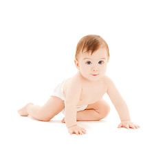 Image showing crawling curious baby