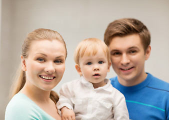 Image showing happy family with adorable baby