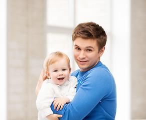 Image showing happy father with adorable baby