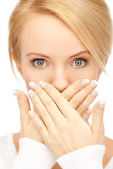 Image showing amazed woman with hand over mouth