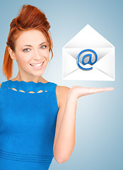 Image showing woman showing virtual envelope