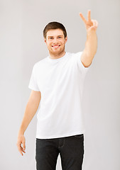 Image showing man showing victory or peace sign