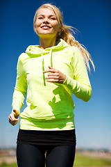 Image showing woman jogging outdoors