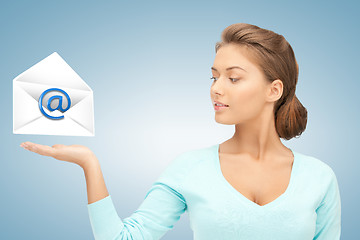 Image showing woman showing virtual envelope