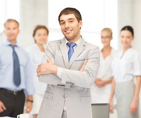 Image showing happy and smiling businessman