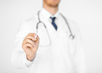 Image showing doctor writing something in the air