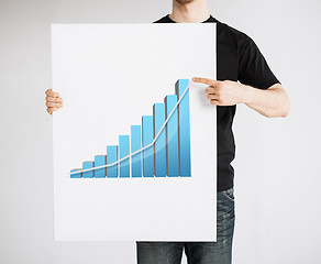 Image showing man holding board with 3d graph