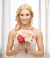 Image showing woman with bouquet of flowers