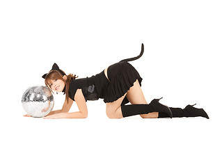 Image showing girl in cat costume with glitter ball