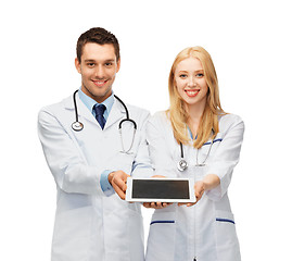 Image showing young doctors showing tablet pc