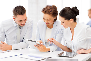 Image showing business team working with tablet pcs in office