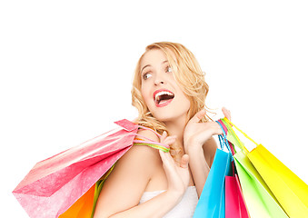 Image showing excited woman with shopping bags
