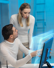 Image showing man and woman working with virtual screen