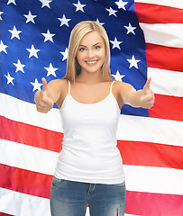 Image showing teenage girl in blank white t-shirt with thumbs up