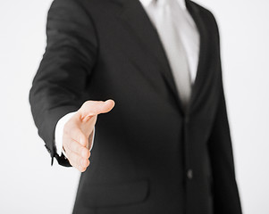 Image showing businessman with open hand