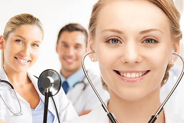 Image showing attractive female doctor with stethoscope