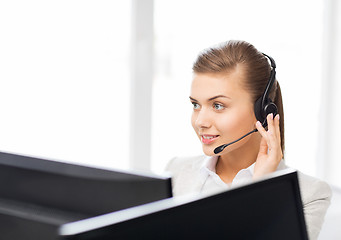 Image showing friendly female helpline operator