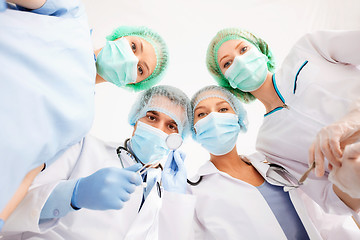 Image showing group of doctors in operating room