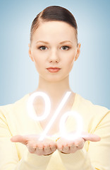 Image showing woman showing sign of percent in her hand