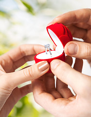 Image showing couple with wedding ring and gift box