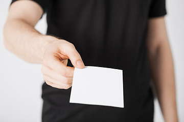 Image showing man hand with blank paper