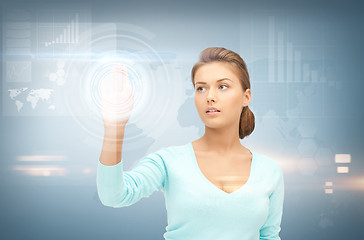 Image showing businesswoman working with something imaginary