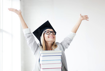 Image showing happy student in graduation cap