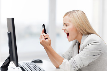 Image showing angry woman with phone