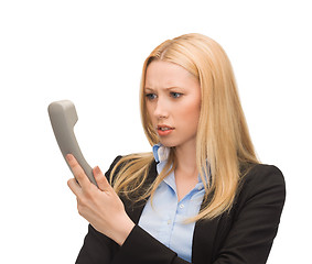 Image showing picture of confused woman with phone