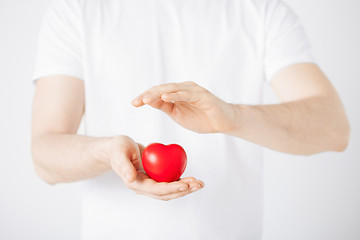 Image showing man hands with heart