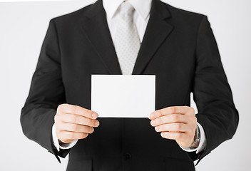Image showing man hand with blank paper