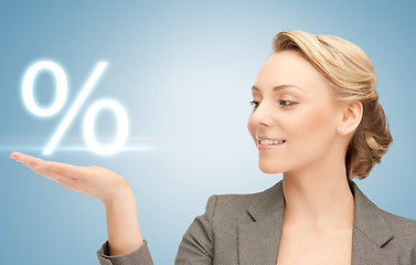 Image showing woman showing sign of percent in her hand