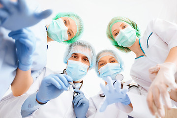 Image showing group of doctors in operating room